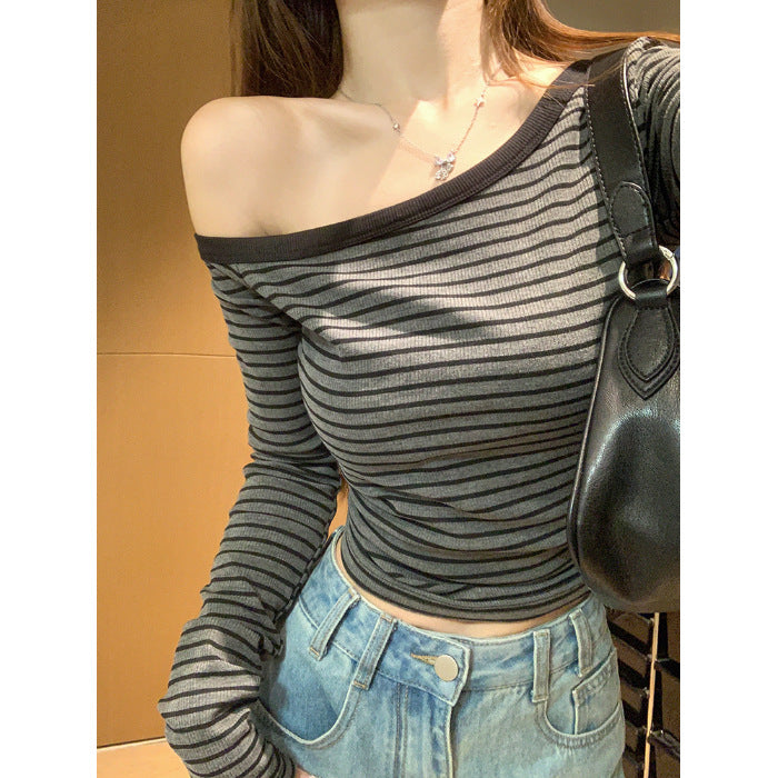 Women's asymmetrical long sleeve shirt with a light stripe pattern Chic & Stil