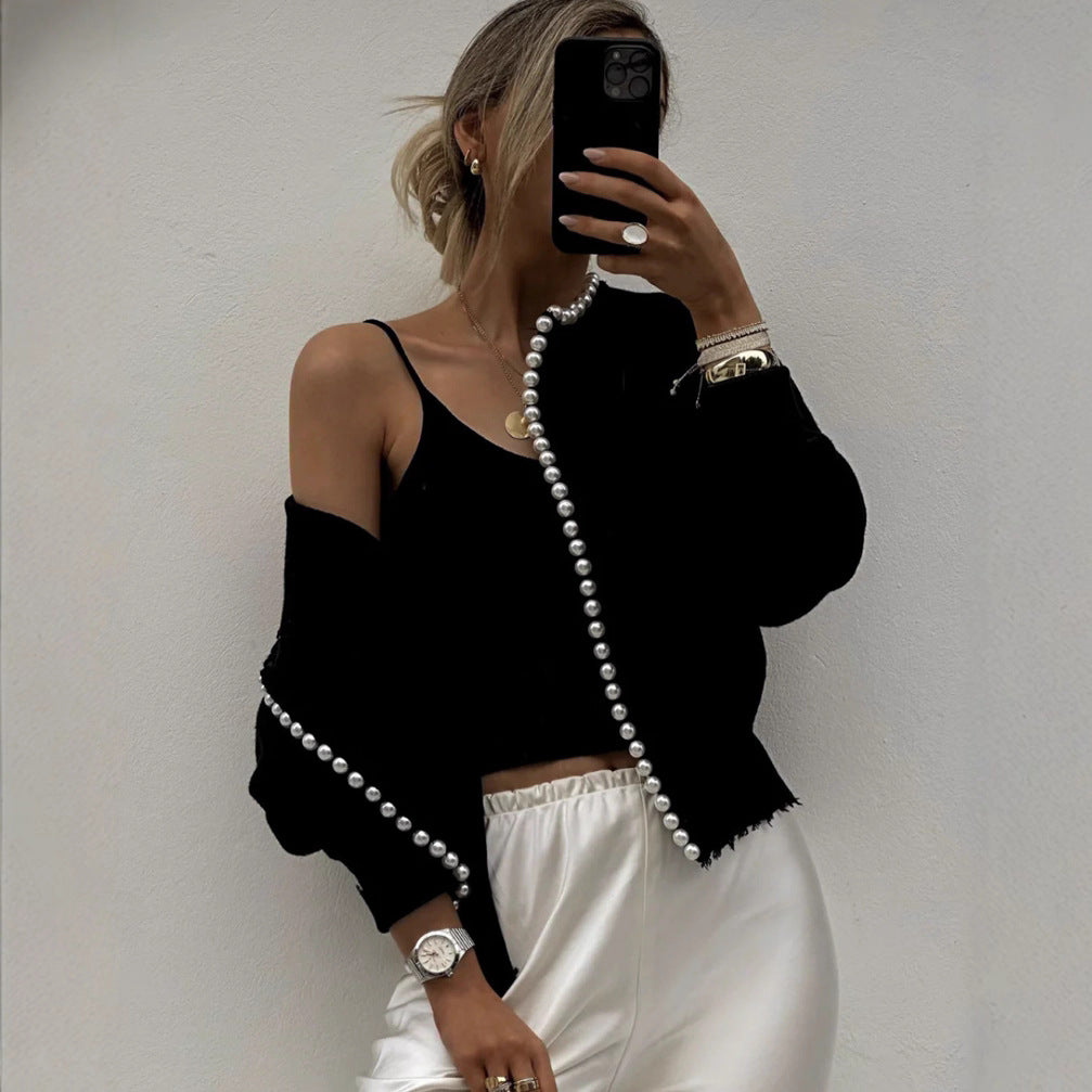 Women's knit jacket with striking bead embellishments and an open design Lune London