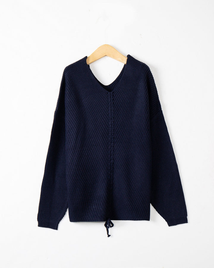 Women's thick knit sweater with an attractive V-neckline and practical drawstring details Lune London
