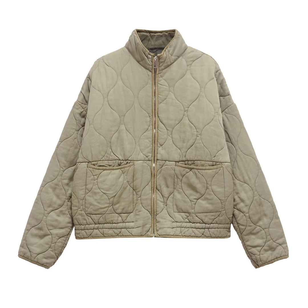Ladies quilted transition jacket with high collar and practical pockets Lune London
