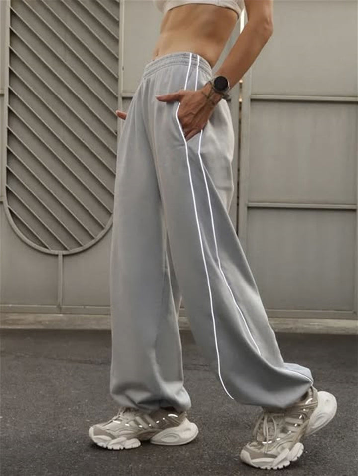 Casual sports pants for women with side stripes and practical pockets Lune London