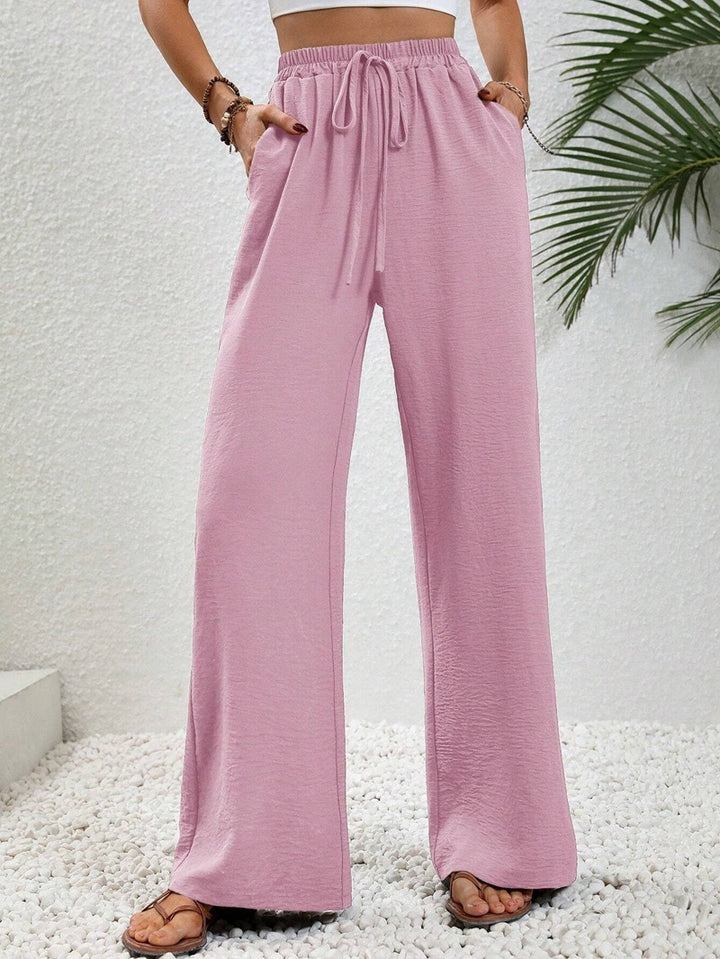 Casual palazzo pants for women with elastic waistband and practical pockets Lune London