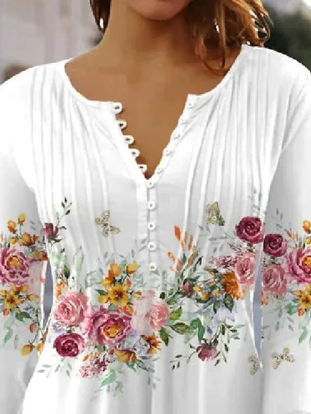 Blouse pour femmes avec imprimé floral et détails de boutons Chic & Stil