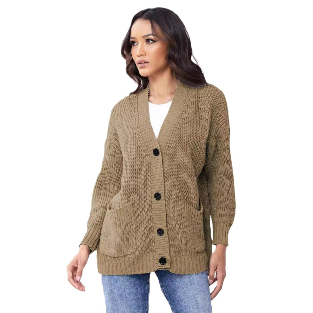 Ladies chunky knit cardigan with large pockets and modern button design Chic and Still