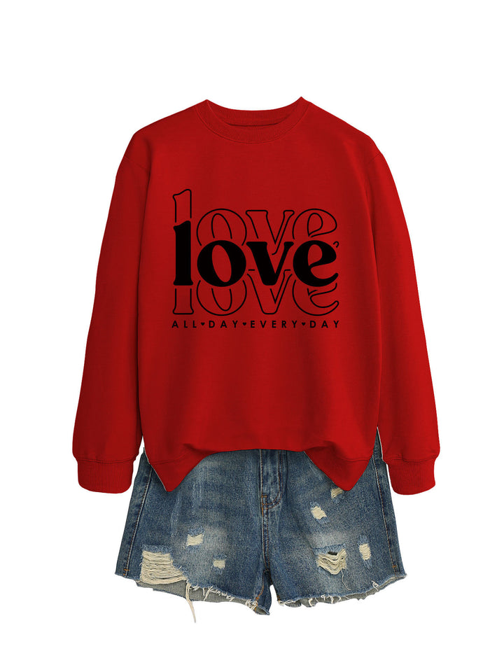 Sweat-shirt pour femmes avec des manches volumineuses et imprimé moderne "love" Chic & Stil