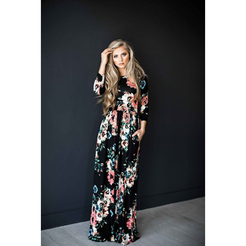 Robe maxi femme avec des motifs floraux et une jupe longue et fluide Chic & Stil