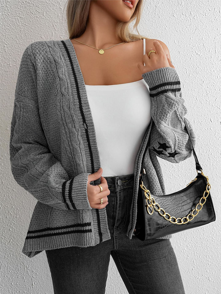 Casual knitted cardigan for women with structured cable knit pattern and decorative buttons Lune London