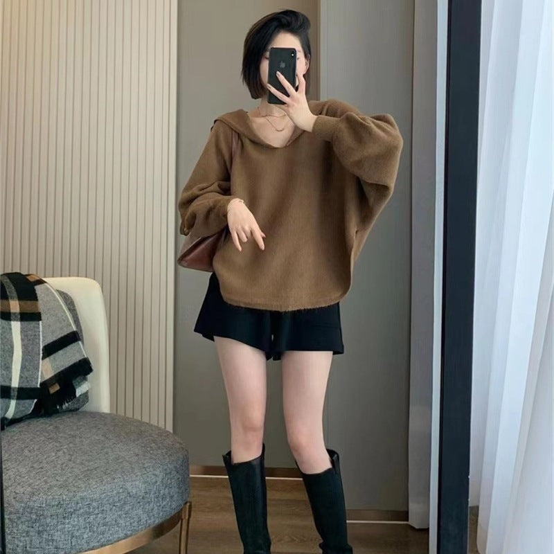 Hoodie féminin à la mode avec des manches volumineuses et une coupe élégante Chic & Stil