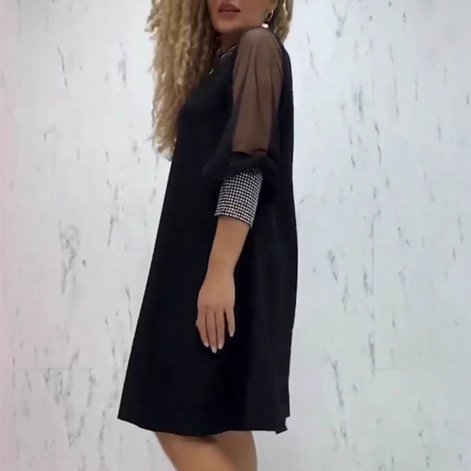 Robe de soirée pour femmes avec des manches transparentes et des accents scintillants Chic & Stil