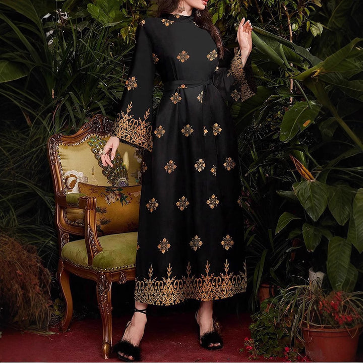 Evening party dress for women with an elegant gold and floral pattern Lune London