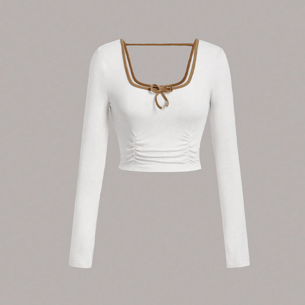 Long sleeve cropped top for women with an elegant square neckline and sophisticated knot details Chic & Stil