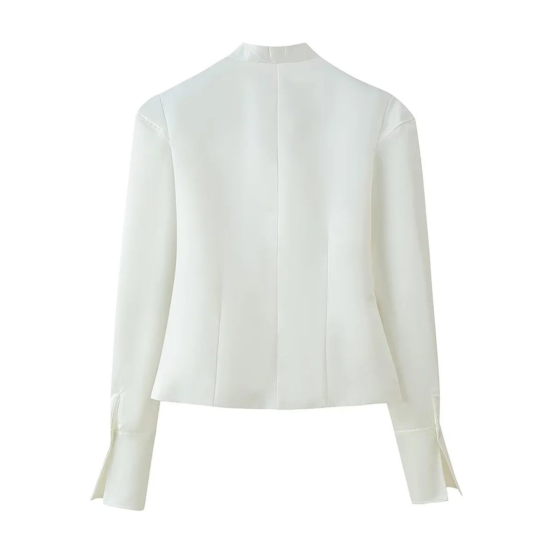 Elegant blazer jacket for women with a fashionable high collar and decorative button details Lune London