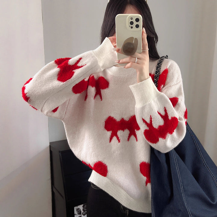 Cozy knitted sweater for women with playful bow pattern Lune London