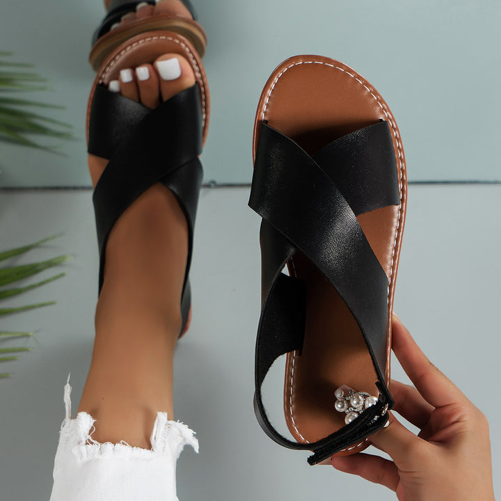 Women's strappy sandals with an elegant cross-strap design Lune London