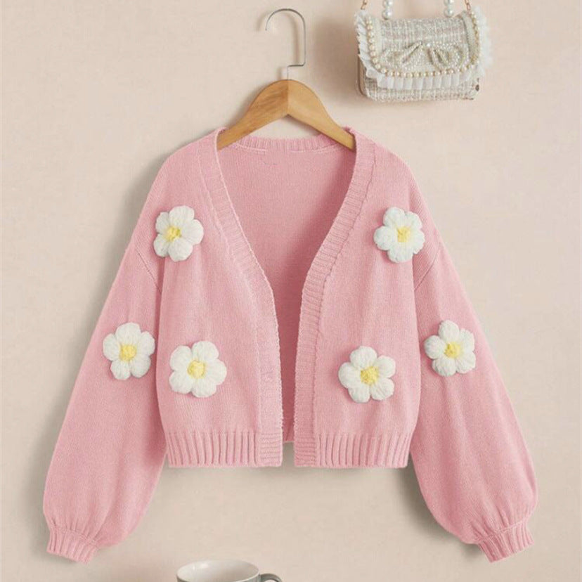 Short jacket for women with playful flower appliqués Lune London