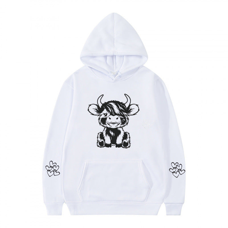 Women's hooded sweatshirt with charming cow motif and practical kangaroo pockets Lune London