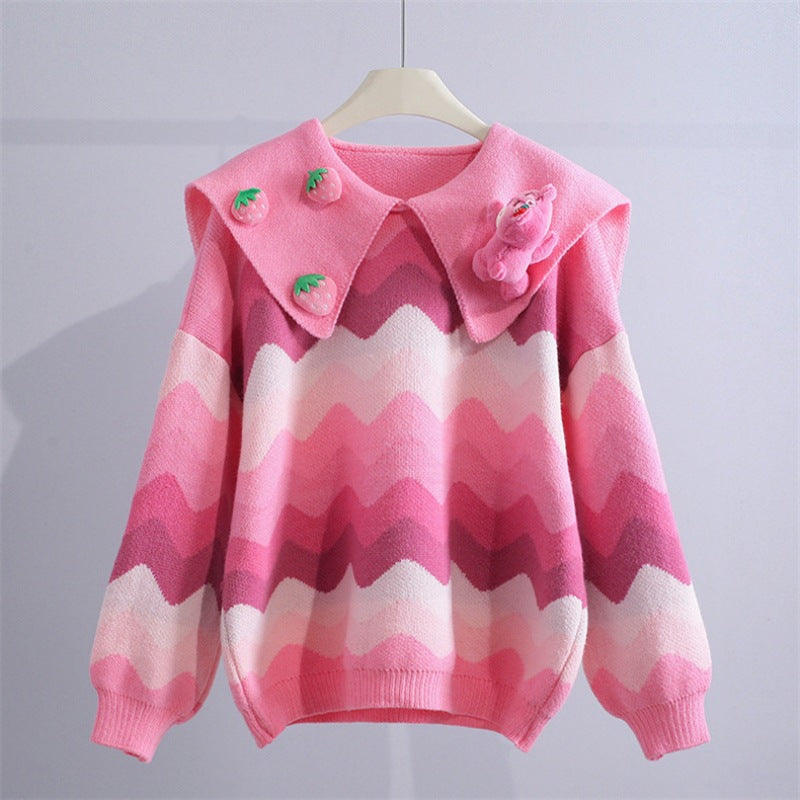Knitted sweater for women with playful appliqués and a wave pattern Lune London