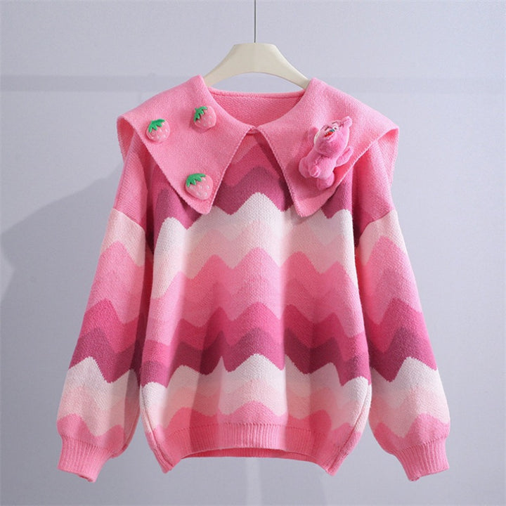 Knitted sweater for women with playful appliqués and a wave pattern Lune London