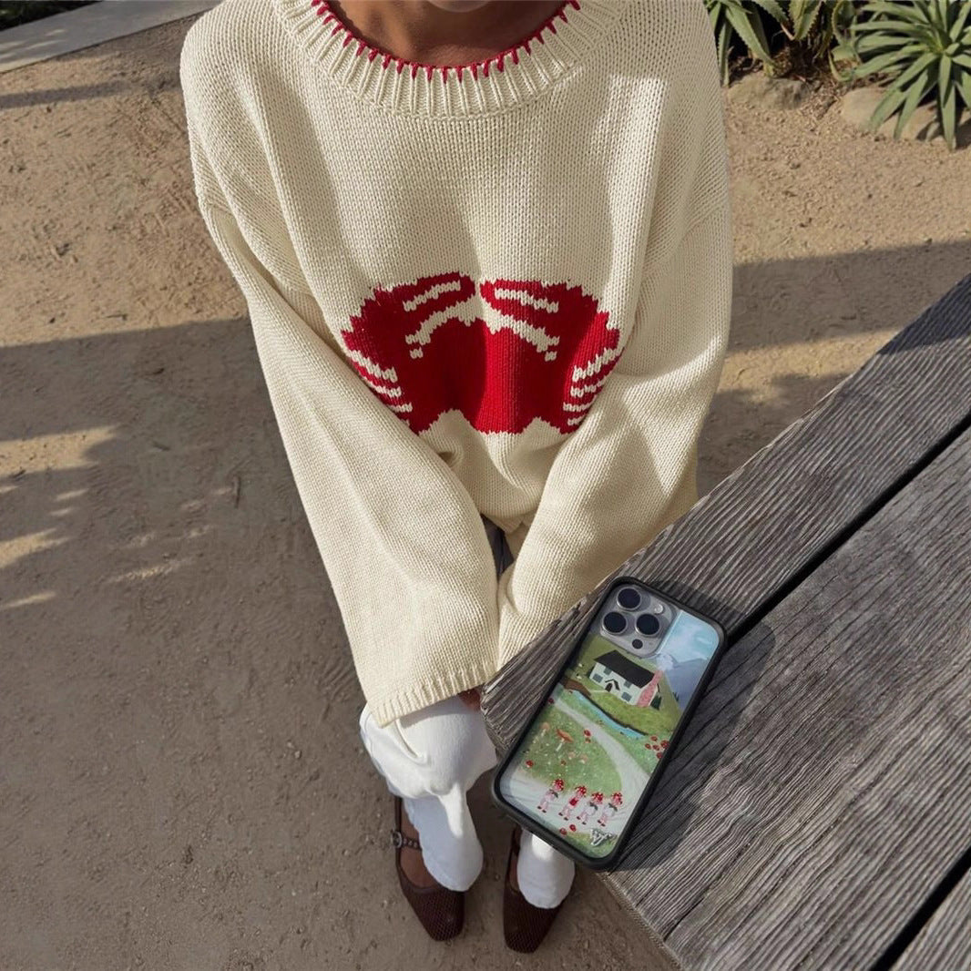 Knitted sweater for women with a climbing creature design Lune London