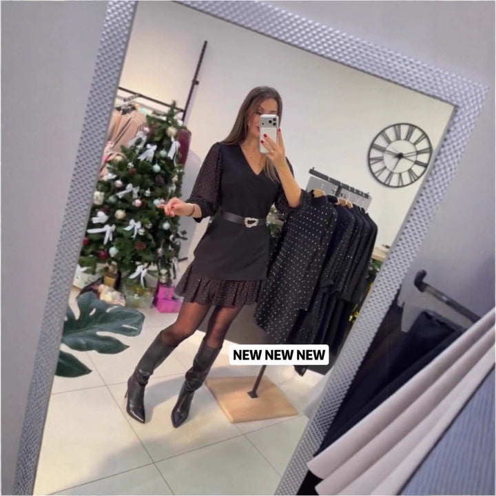 Robe élégante pour dames avec des manches bouffantes transparentes et une ceinture de fermeture Chic & Stil