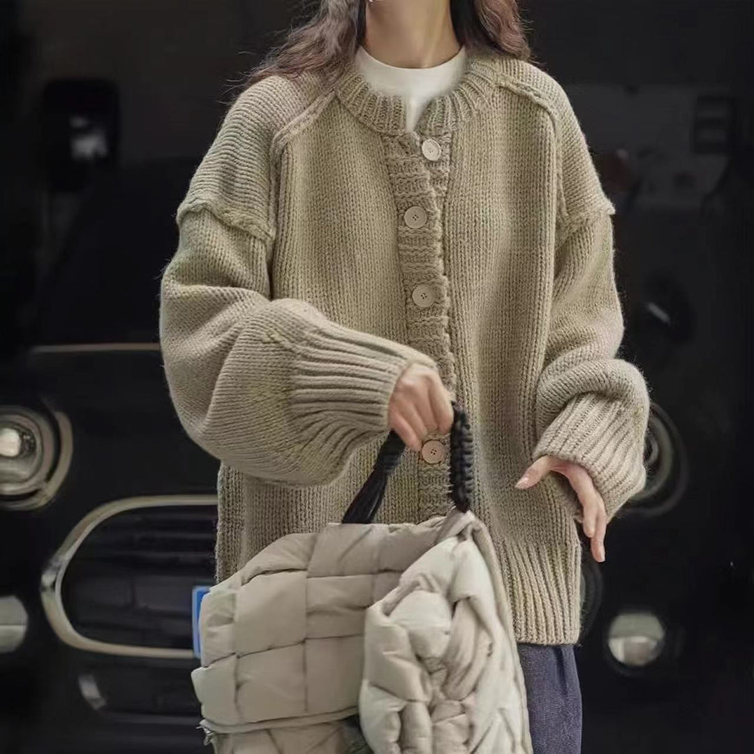 Oversized knitted jacket for women with special button details and wide sleeves Lune London
