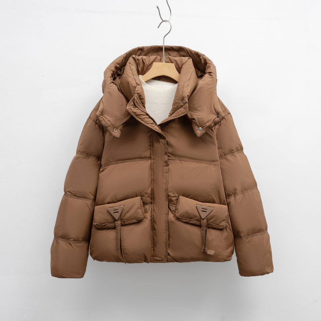 Ladies insulated quilted jacket with practical pockets and hood Lune London