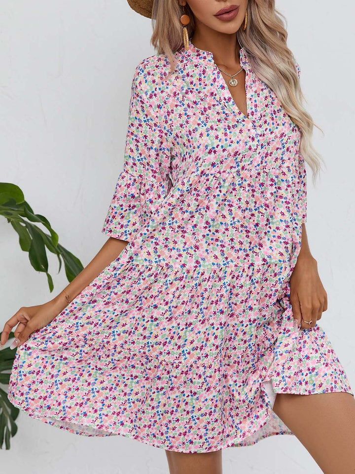 Shirt dress for women with voluminous ruffled sleeves and a playful floral pattern Lune London