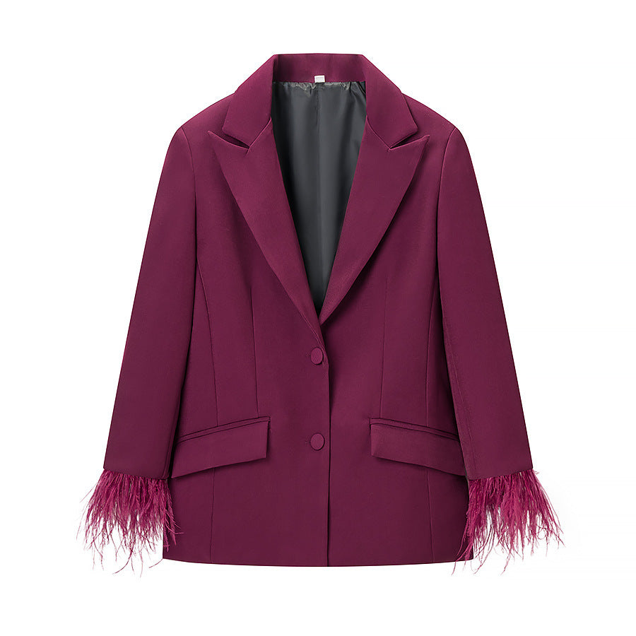 Blazer de mode pour femmes avec garniture en plumes frappante Chic & Stil