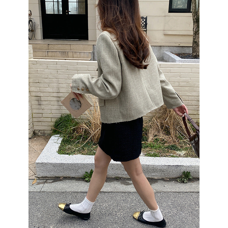 Women's fashionable jacket with textured design and double button placket Chic & Stil
