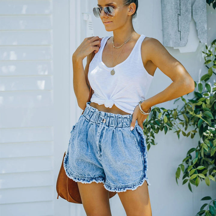 Women's denim shorts with frayed hem and elastic waistband Lune London