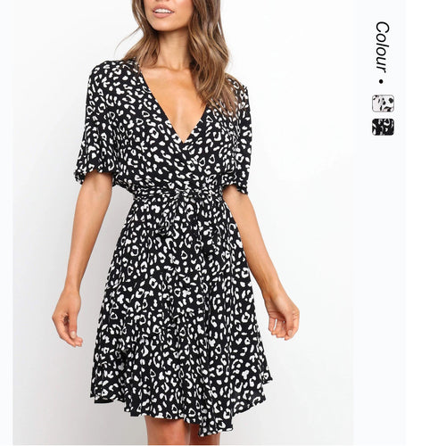 Women's wrap dress with generous ruffle sleeves and beautiful animal print Lune London