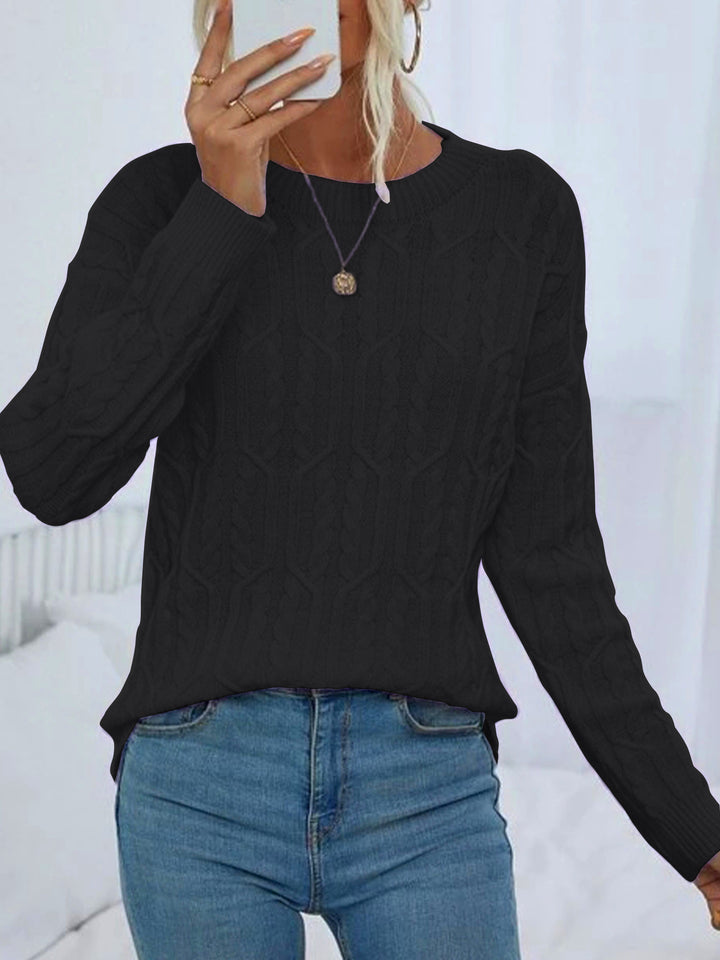 Ladies knit sweater with cable pattern demanding Lune London