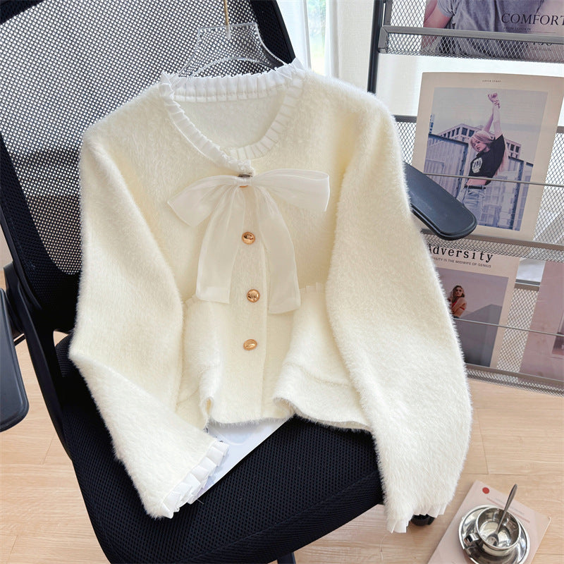 Cardigan Fluffy pour Femmes avec Col en Nœud Élegant et Boutons Décoratifs Chic & Stil