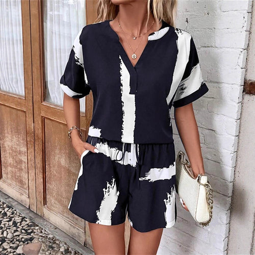 Summer jumpsuit for women with an elegant V-neck and practical pockets Lune London