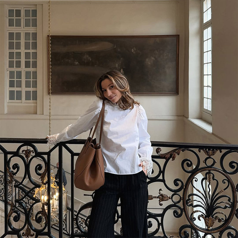 Blouse for women with elegant lace accents and puff sleeves Lune London
