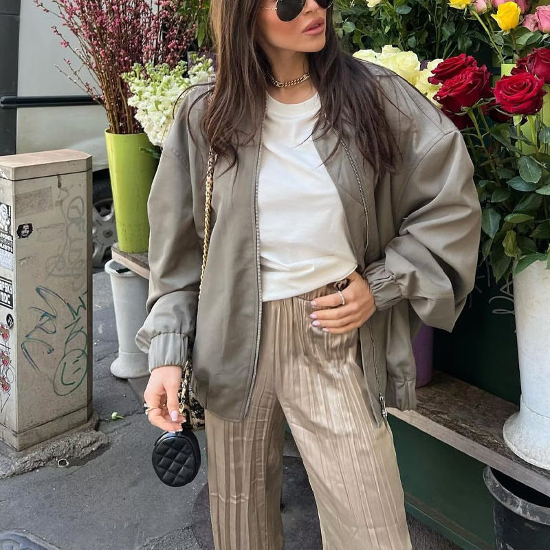 Casual bomber jacket for women in lightweight material with elastic hem and practical pockets Lune London