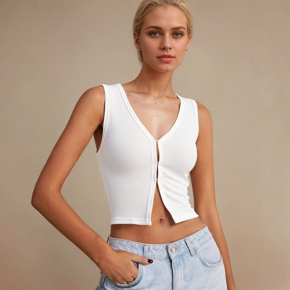 Short top for women with deep V-neck and decorative button design Chic & Stil