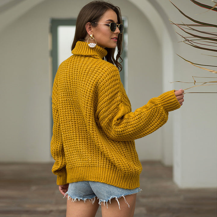 Chunky knit sweater for women with a high collar and cable knit pattern Lune Londonl