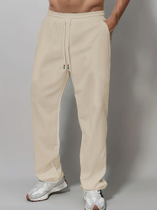 Men's Sporty Relaxed Fit Jogging Pants with Elastic Waistband and Side Pockets Chic & Stil