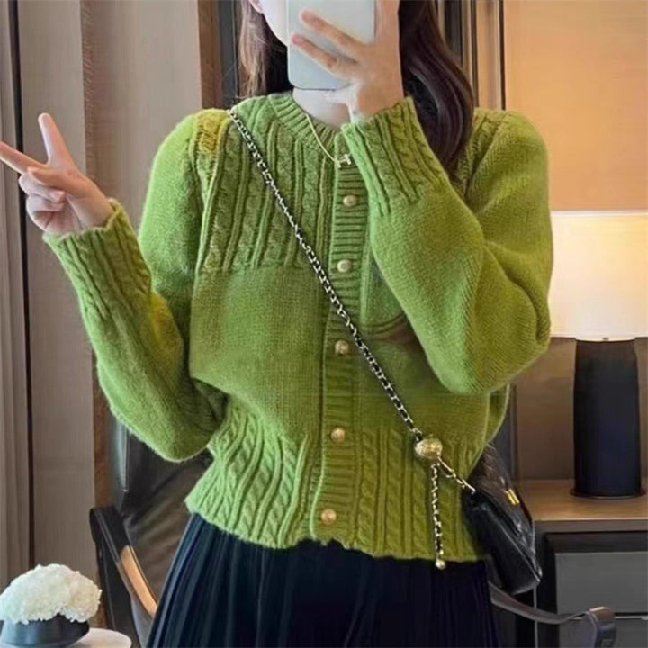 Ladies cozy knit pullover with cable texture and chic gold button details