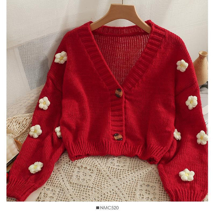 Ladies cozy knit cardigan with playful floral appliqués Lune London