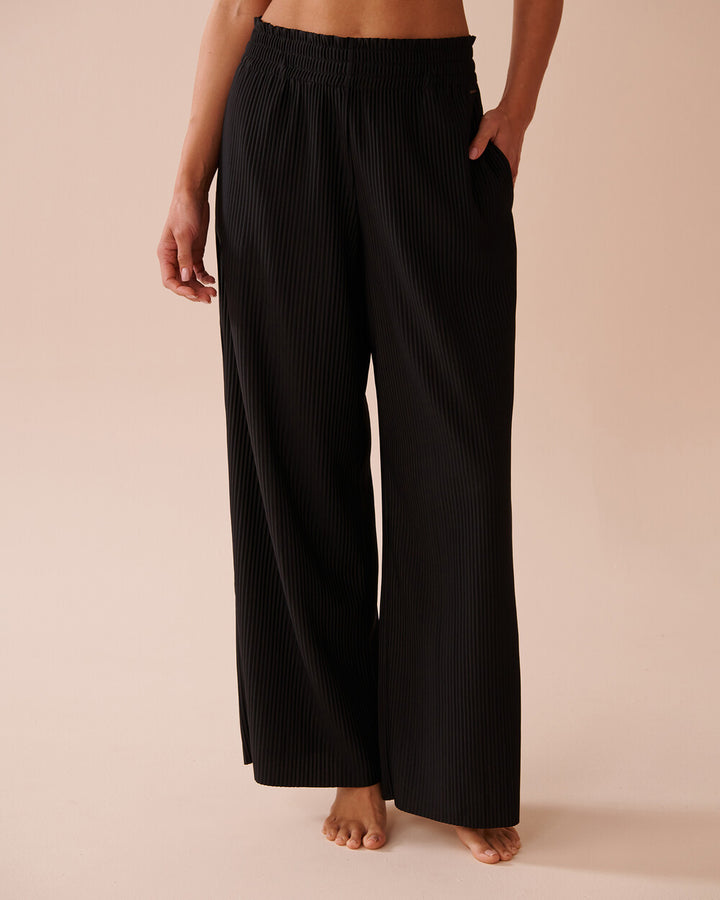 Wide pleated pants for women with elastic waistband and side pockets Lune London
