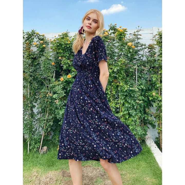 Robe midi femme avec motifs floraux et ourlet volant Chic & Stil