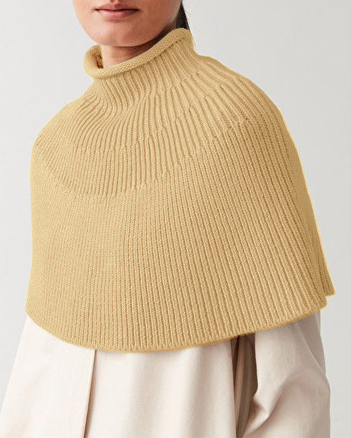 Knitted cape for women with high collar and fine rib structure Lune London