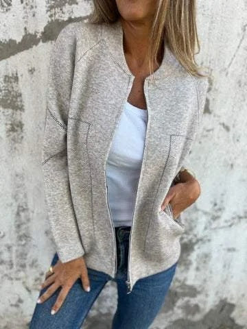 Ladies' knit jacket with stylish zipper details and a fine textured pattern Lune London