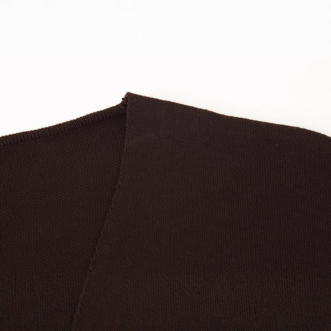 Women layered V-neck sweater with an elegant button detail Lune London