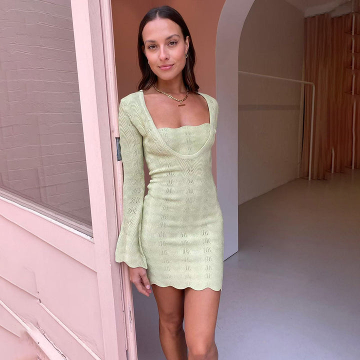 Knit dress for women with deep V-neckline and wave hem Lune London