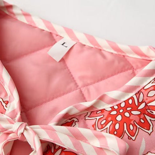 Ladies quilted gilet with floral patterns and tie Lune London