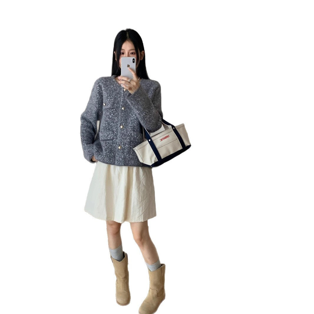 Veste en tricot confortable pour femmes avec détails en bouton et poches plaquées Chic & Stil