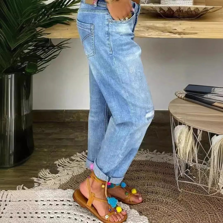 Women's Mom Jeans with button closure and stylish distressed details